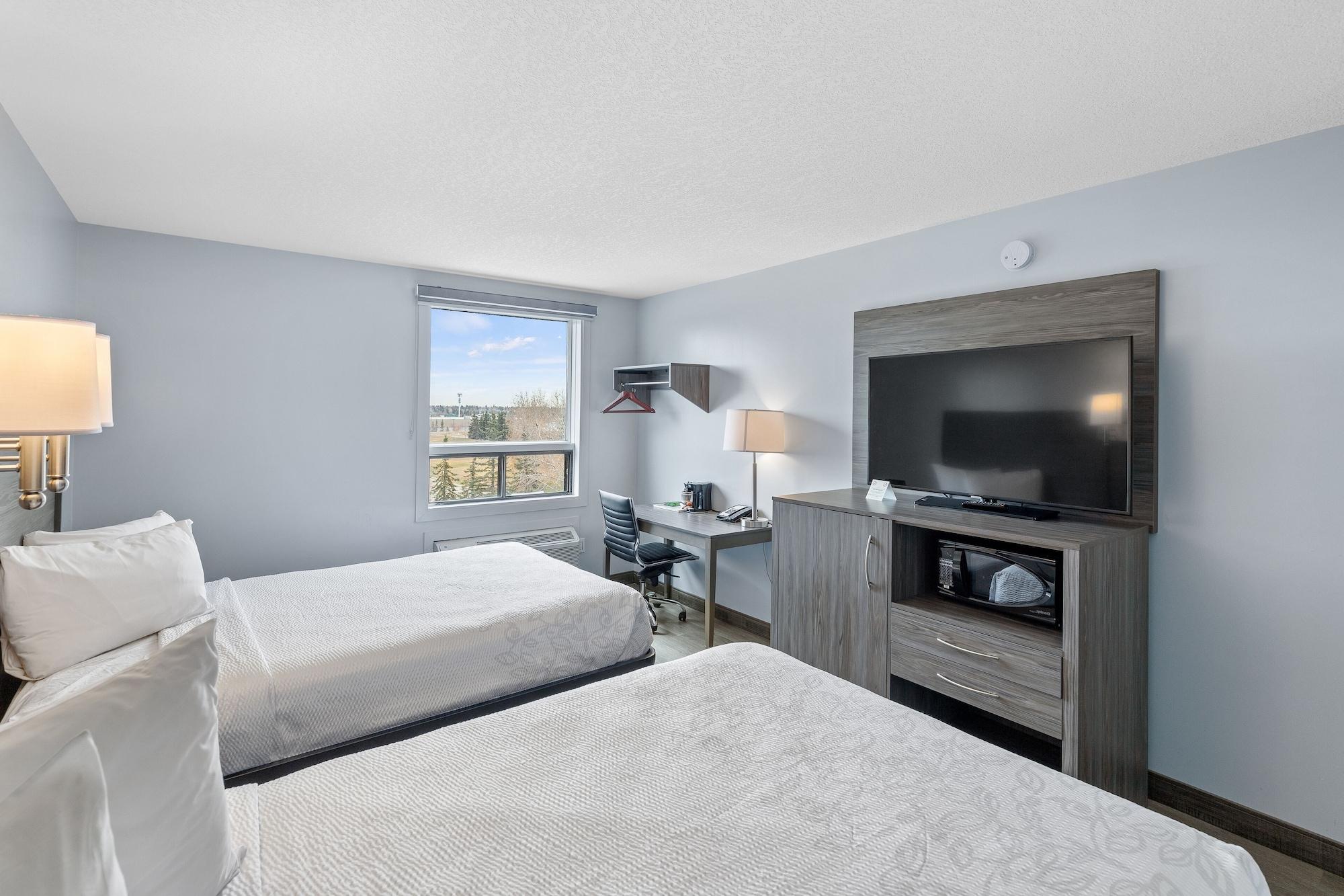 Emerald Hotel & Suites Calgary Airport Экстерьер фото